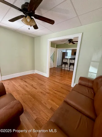 a view of livingroom with furniture and window