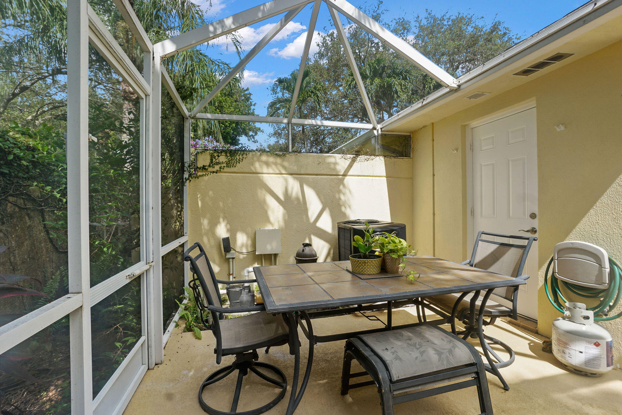 198 Brier Circle Jupiter, FL 33458 - Photo 37 of 38 a view of an outdoor sitting area