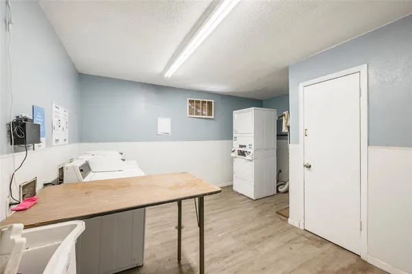 a room with a table and chairs