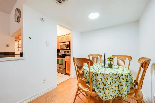 a view of a dining room with furniture