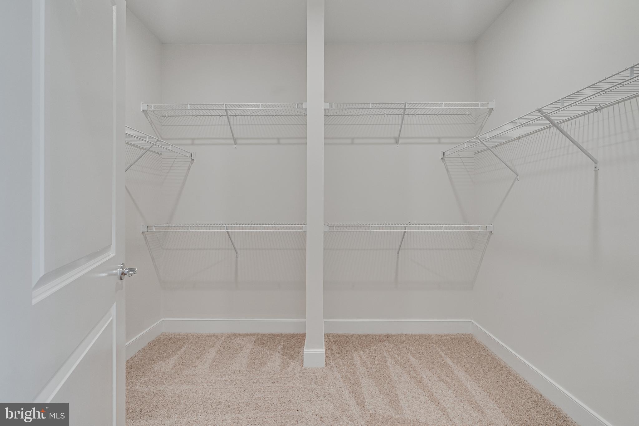 11200 Reston Station Boulevard, Unit 207 Reston, VA 20190 - Photo 16 of 40 a view of a room with racks on the wall