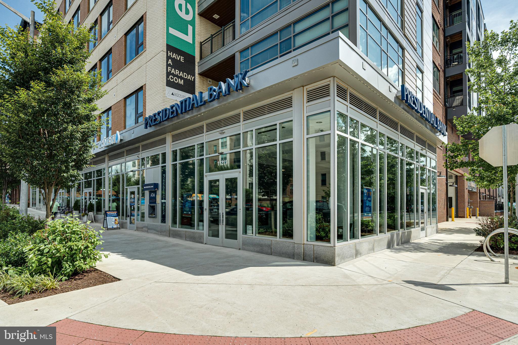 11200 Reston Station Boulevard, Unit 207 Reston, VA 20190 - Photo 37 of 40 a view of a building with a street