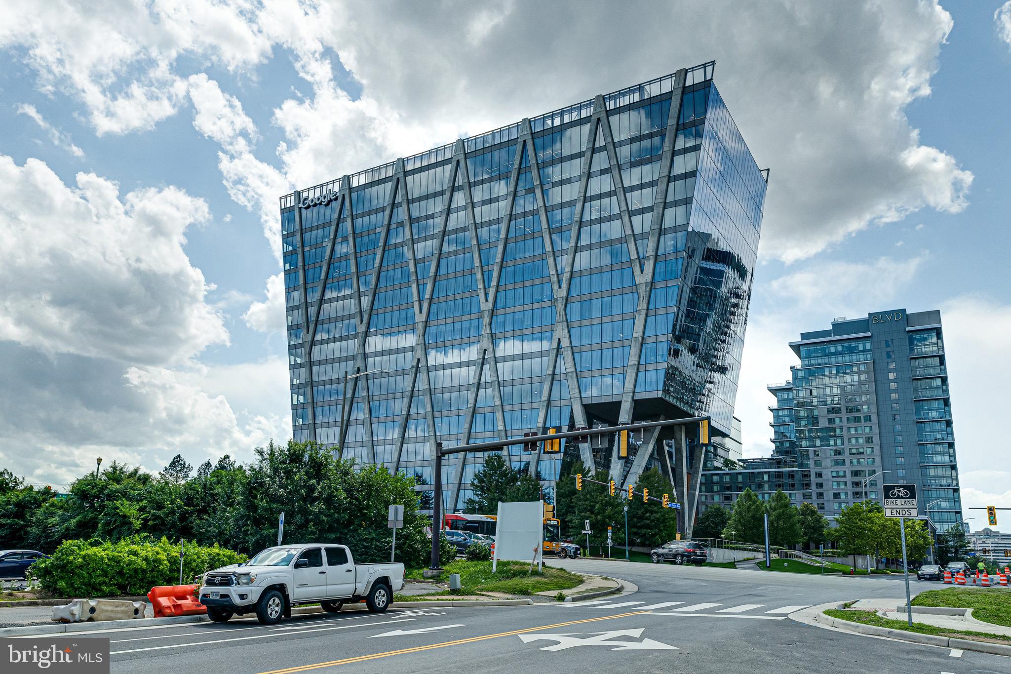 11200 Reston Station Boulevard, Unit 207 Reston, VA 20190 - Photo 38 of 40 a car parked in front of a building