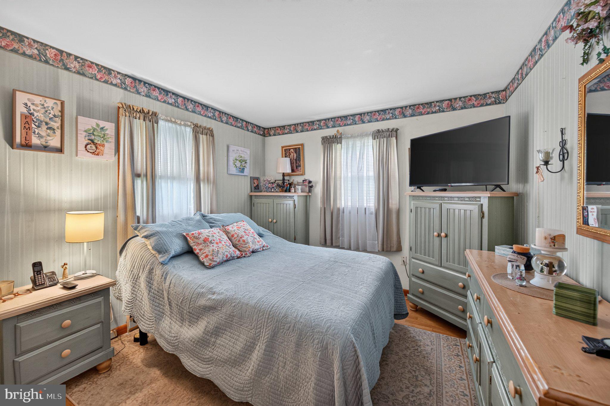 9005 Charles Town Road Ranson, WV 25438 - Photo 22 of 31 Charming bedroom with vintage accents.