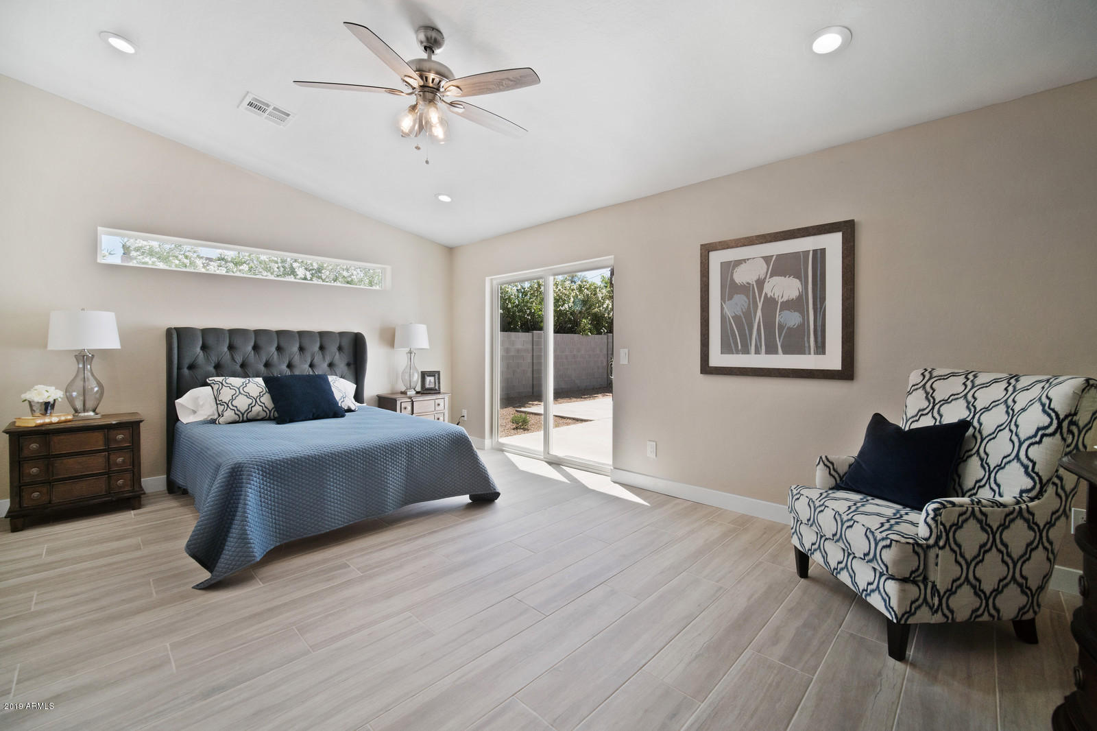 3351 North Randolph Road Phoenix, AZ 85014 - Photo 15 of 47 a bedroom with bed and window