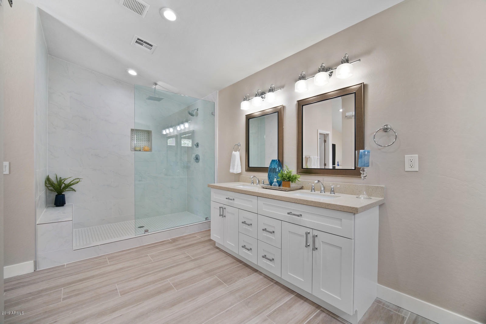 3351 North Randolph Road Phoenix, AZ 85014 - Photo 20 of 47 a bathroom with a double vanity sink and a mirror