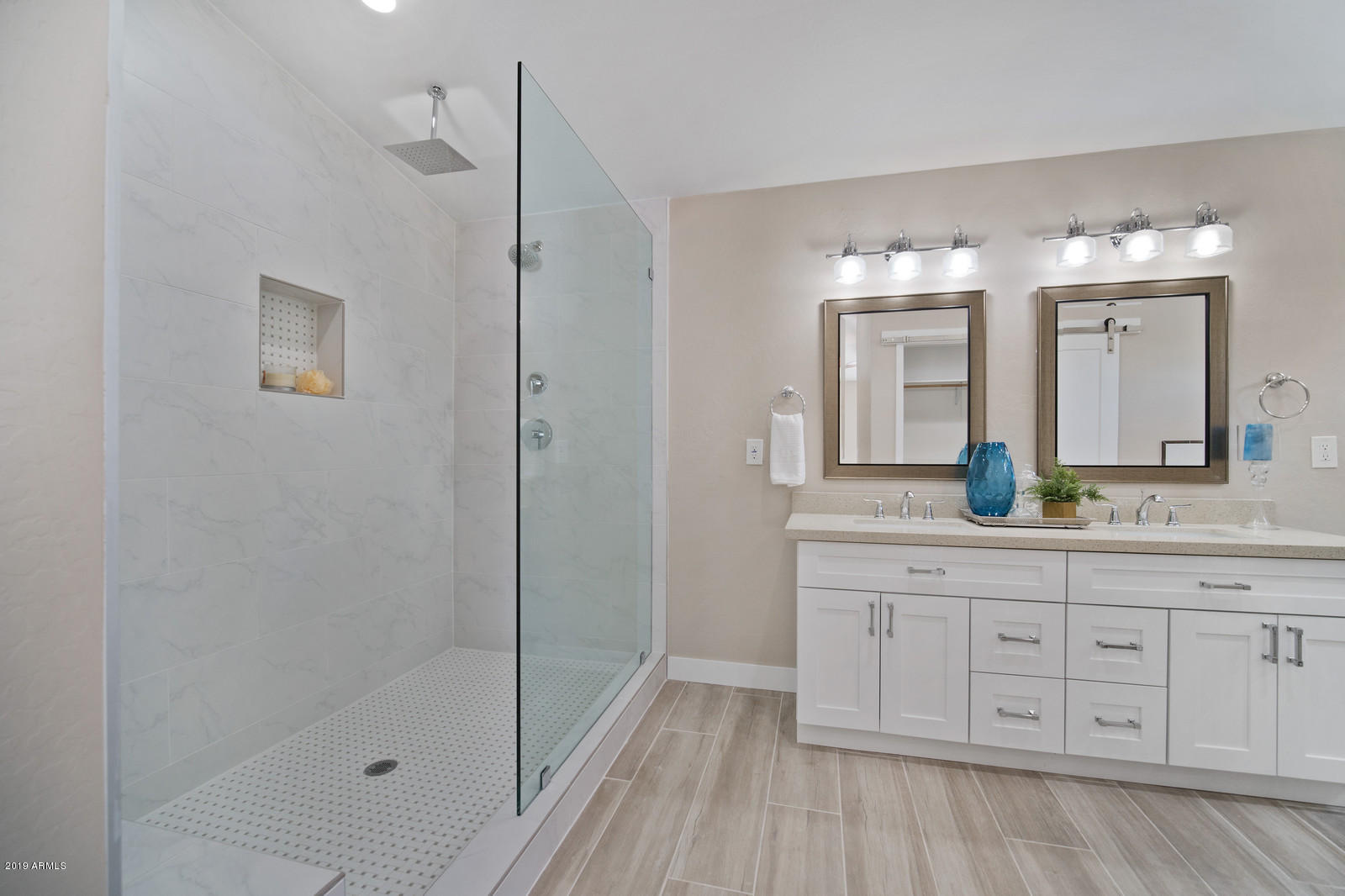 3351 North Randolph Road Phoenix, AZ 85014 - Photo 21 of 47 a spacious bathroom with a granite countertop sink a mirror and shower