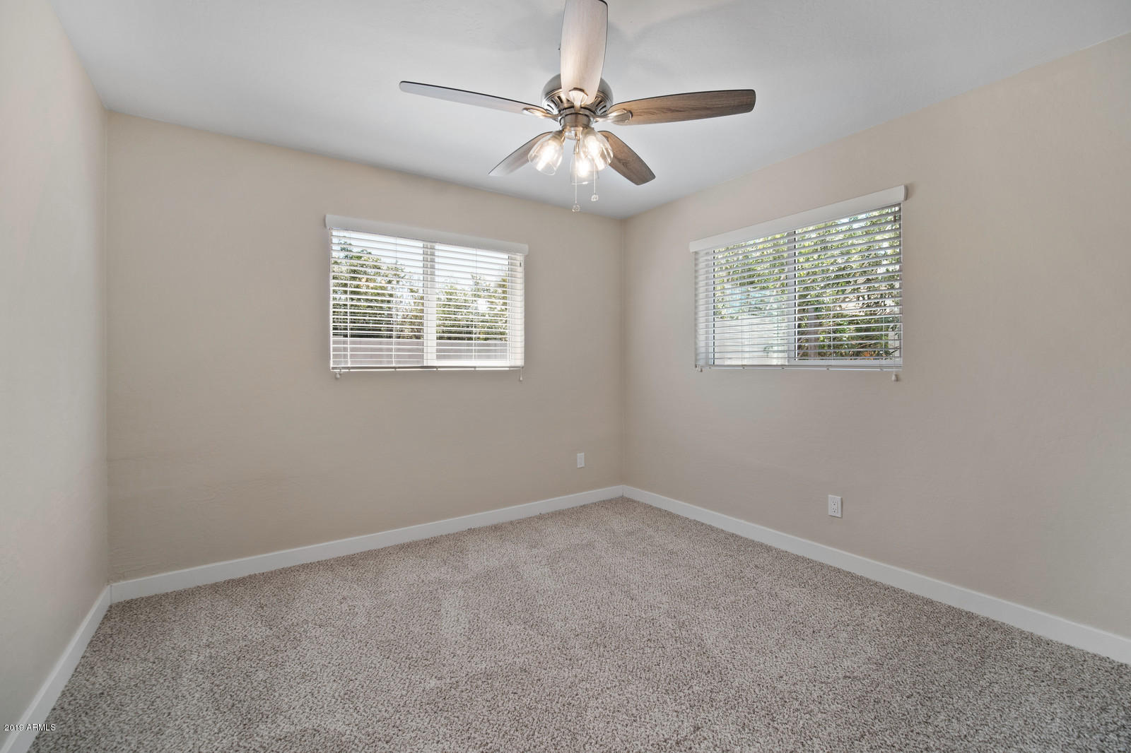 3351 North Randolph Road Phoenix, AZ 85014 - Photo 24 of 47 a view of an empty room with a window