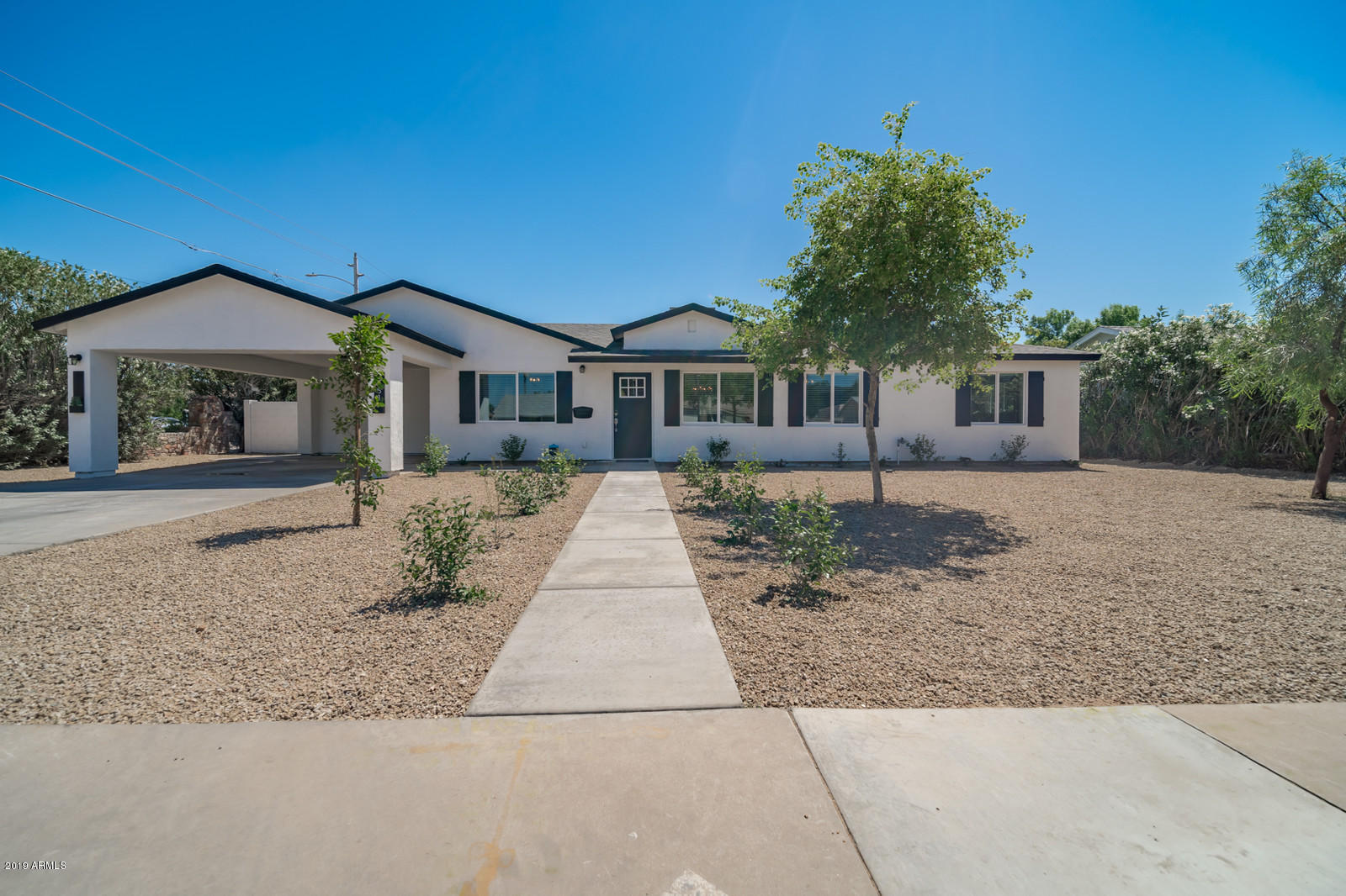 3351 North Randolph Road Phoenix, AZ 85014 - Photo 34 of 47 front view of a house with a yard
