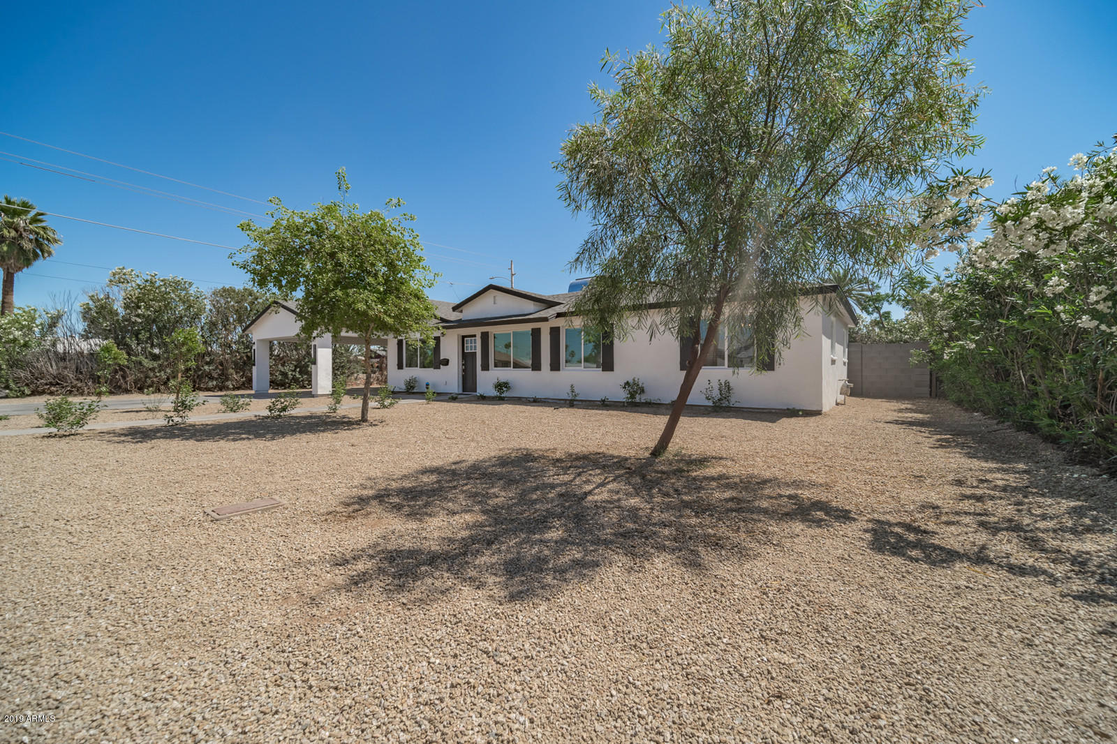3351 North Randolph Road Phoenix, AZ 85014 - Photo 36 of 47 a street view with large trees
