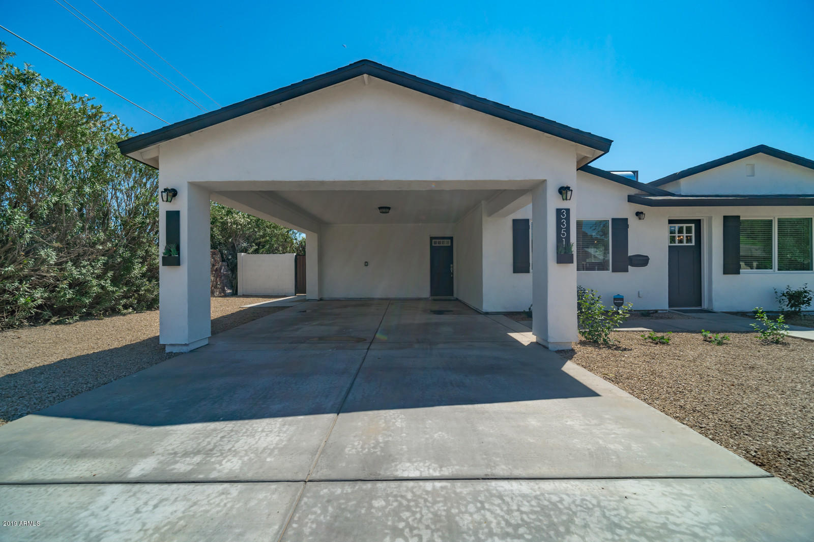 3351 North Randolph Road Phoenix, AZ 85014 - Photo 38 of 47 a front view of a house with a yard
