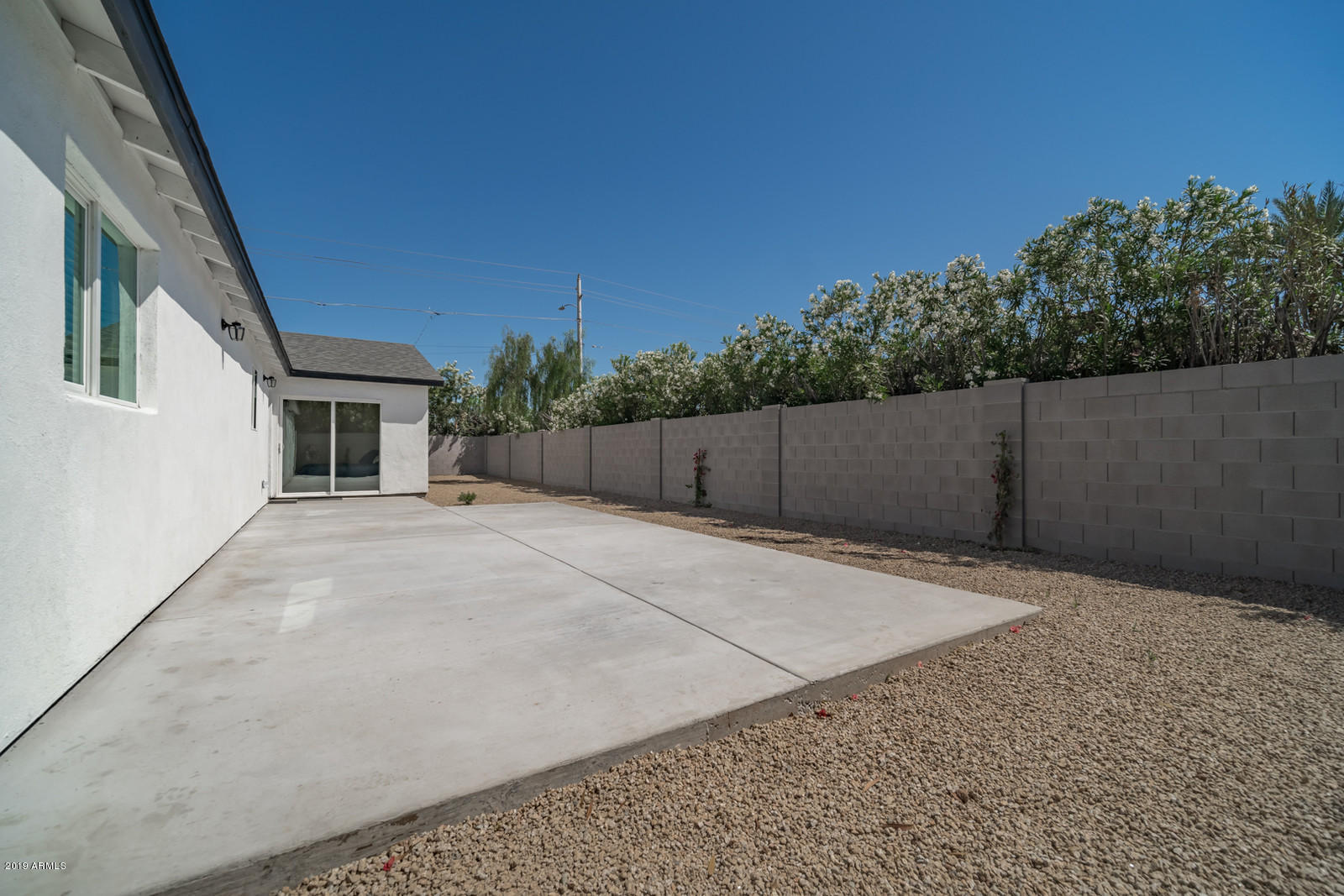 3351 North Randolph Road Phoenix, AZ 85014 - Photo 41 of 47 a backyard of a house with lots of green space