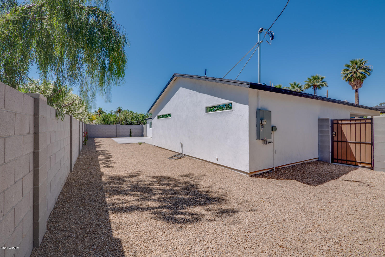 3351 North Randolph Road Phoenix, AZ 85014 - Photo 42 of 47 a view of a house with a yard