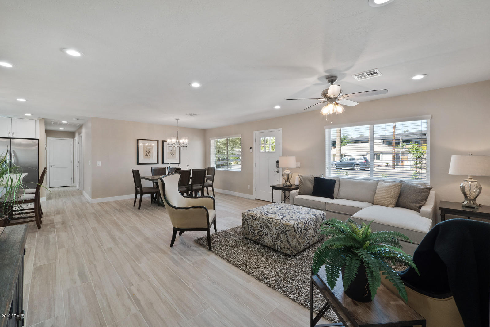 3351 North Randolph Road Phoenix, AZ 85014 - Photo 7 of 47 a living room with furniture and a wooden floor