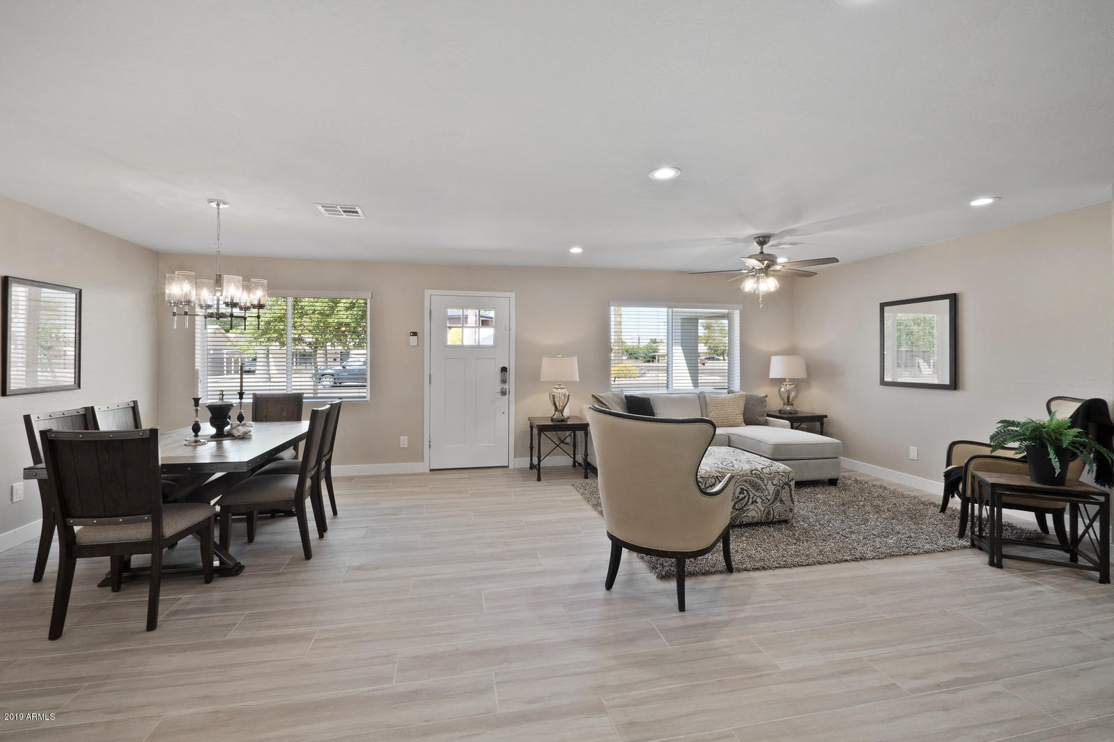 3351 North Randolph Road Phoenix, AZ 85014 - Photo 9 of 47 a living room with furniture and a wooden floor