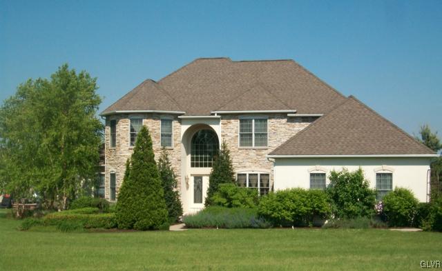 186 Heyer Road Nazareth, PA 18064 - Photo 1 of 49 a front view of a house with a yard