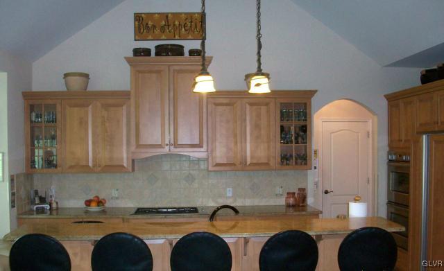 186 Heyer Road Nazareth, PA 18064 - Photo 14 of 49 a kitchen with a sink cabinets and appliances