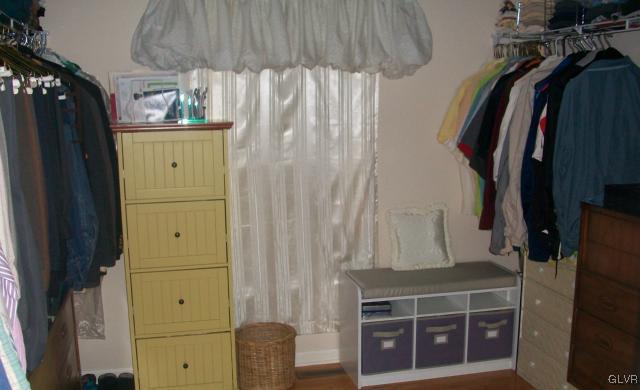 186 Heyer Road Nazareth, PA 18064 - Photo 28 of 49 a view of walk in closet with clothes and shoes