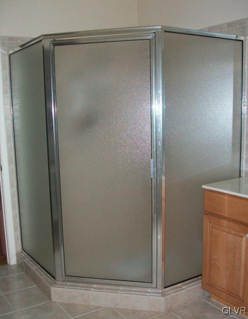 186 Heyer Road Nazareth, PA 18064 - Photo 30 of 49 a bathroom with a glass shower door