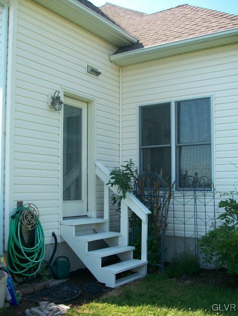 186 Heyer Road Nazareth, PA 18064 - Photo 43 of 49 a front view of a house with garden