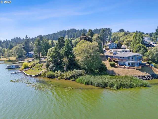 a view of a swimming pool with a yard and mountain view