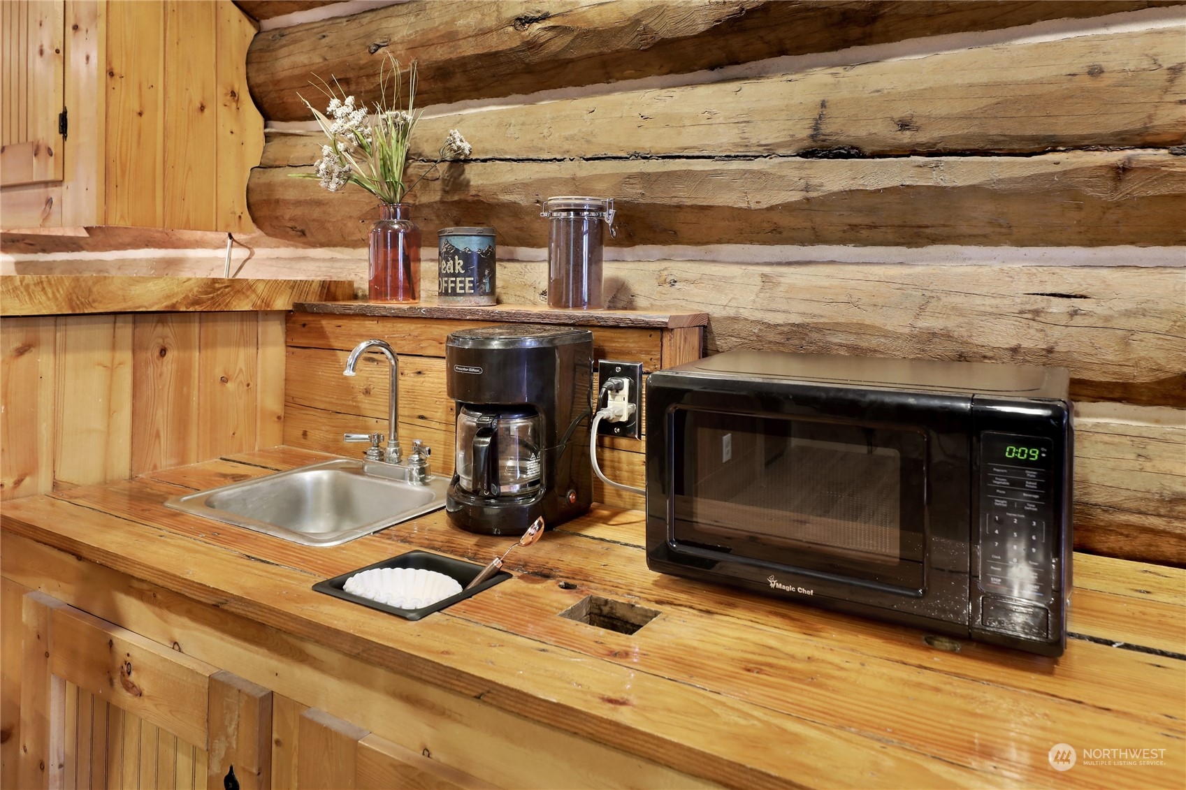 2011 Clear Valley Drive Maple Falls, WA 98266 - Photo 11 of 40 a kitchen with a stove and a sink