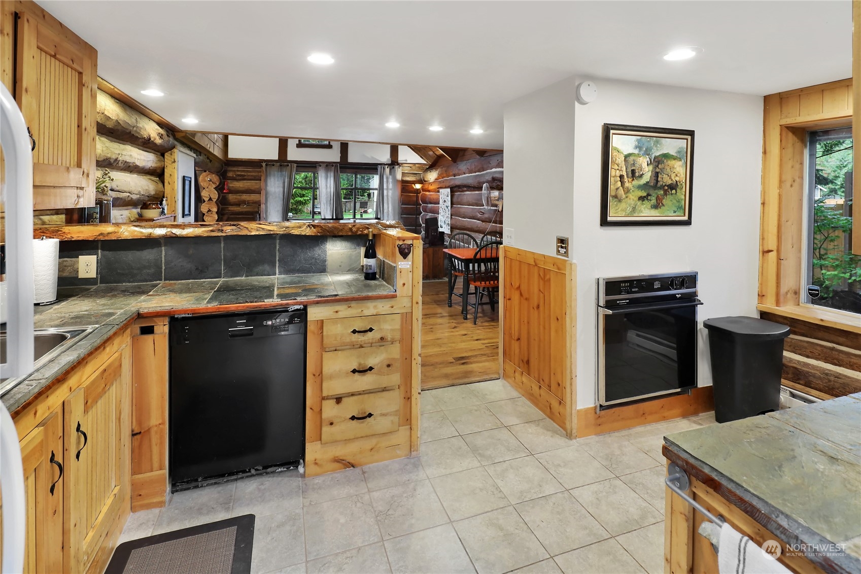 2011 Clear Valley Drive Maple Falls, WA 98266 - Photo 14 of 40 a kitchen with stainless steel appliances granite countertop a stove and a refrigerator