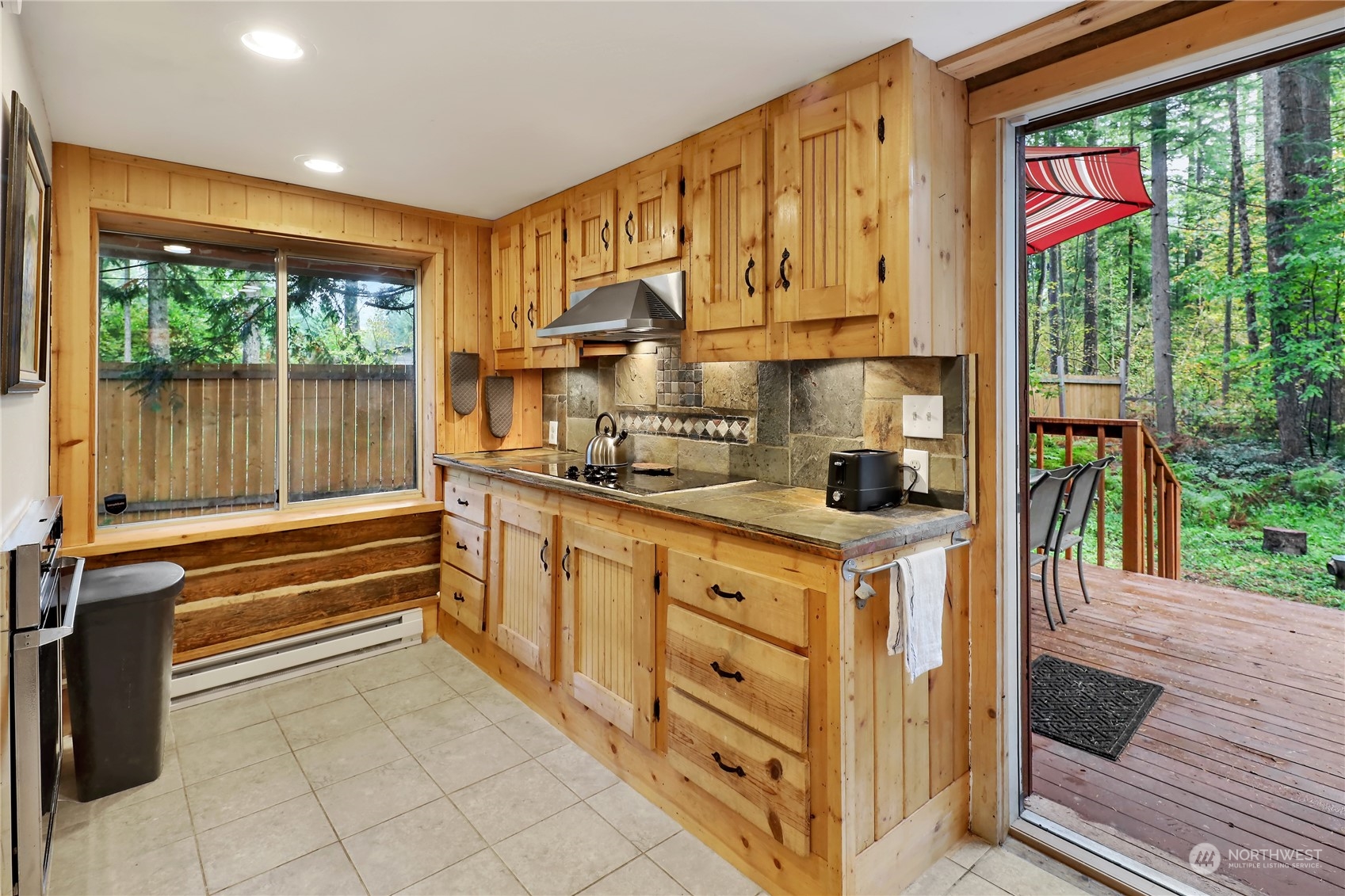 2011 Clear Valley Drive Maple Falls, WA 98266 - Photo 15 of 40 a kitchen with granite countertop a stove a sink and a refrigerator