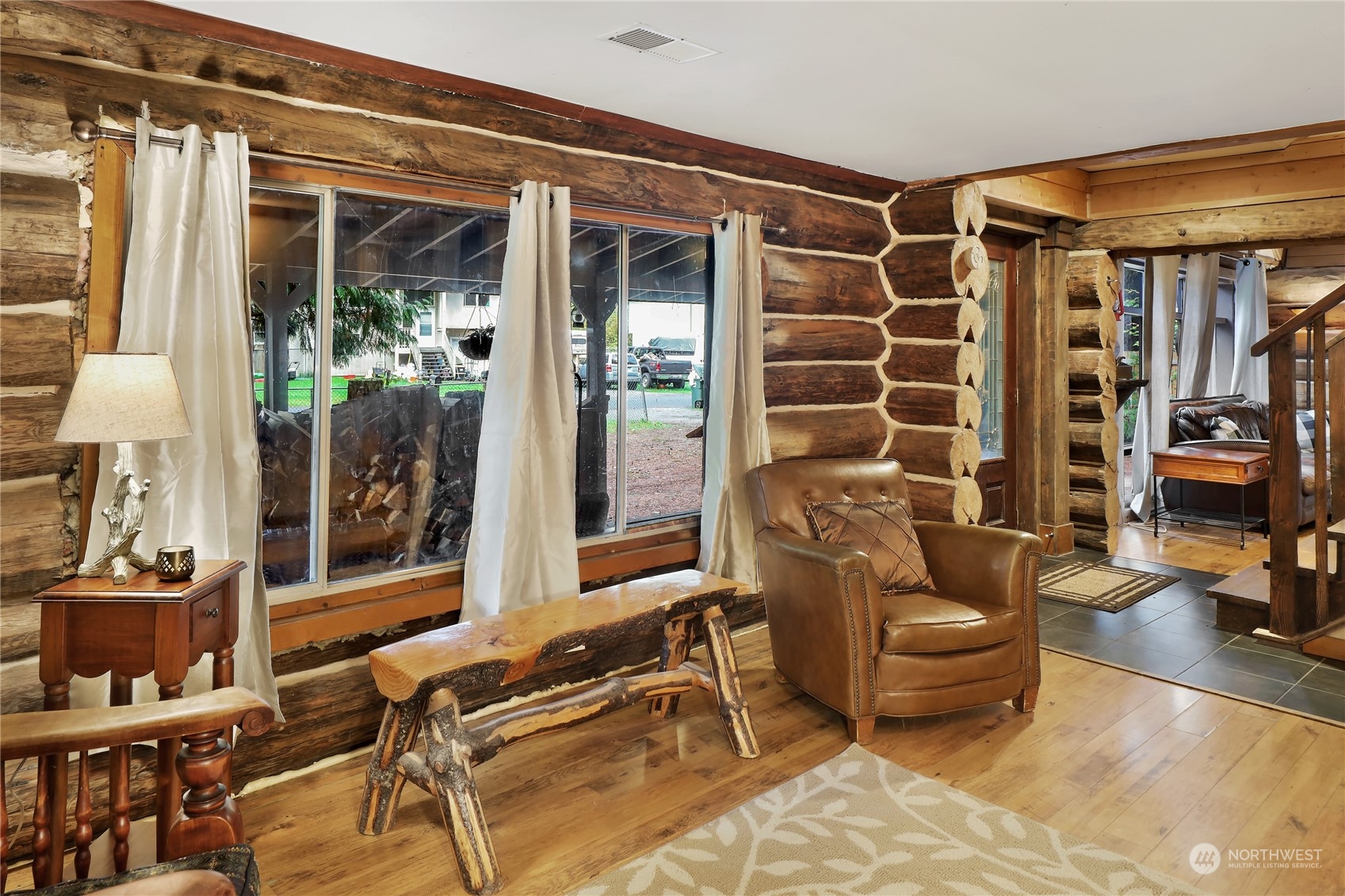 2011 Clear Valley Drive Maple Falls, WA 98266 - Photo 20 of 40 a outdoor living space with patio furniture and potted plants
