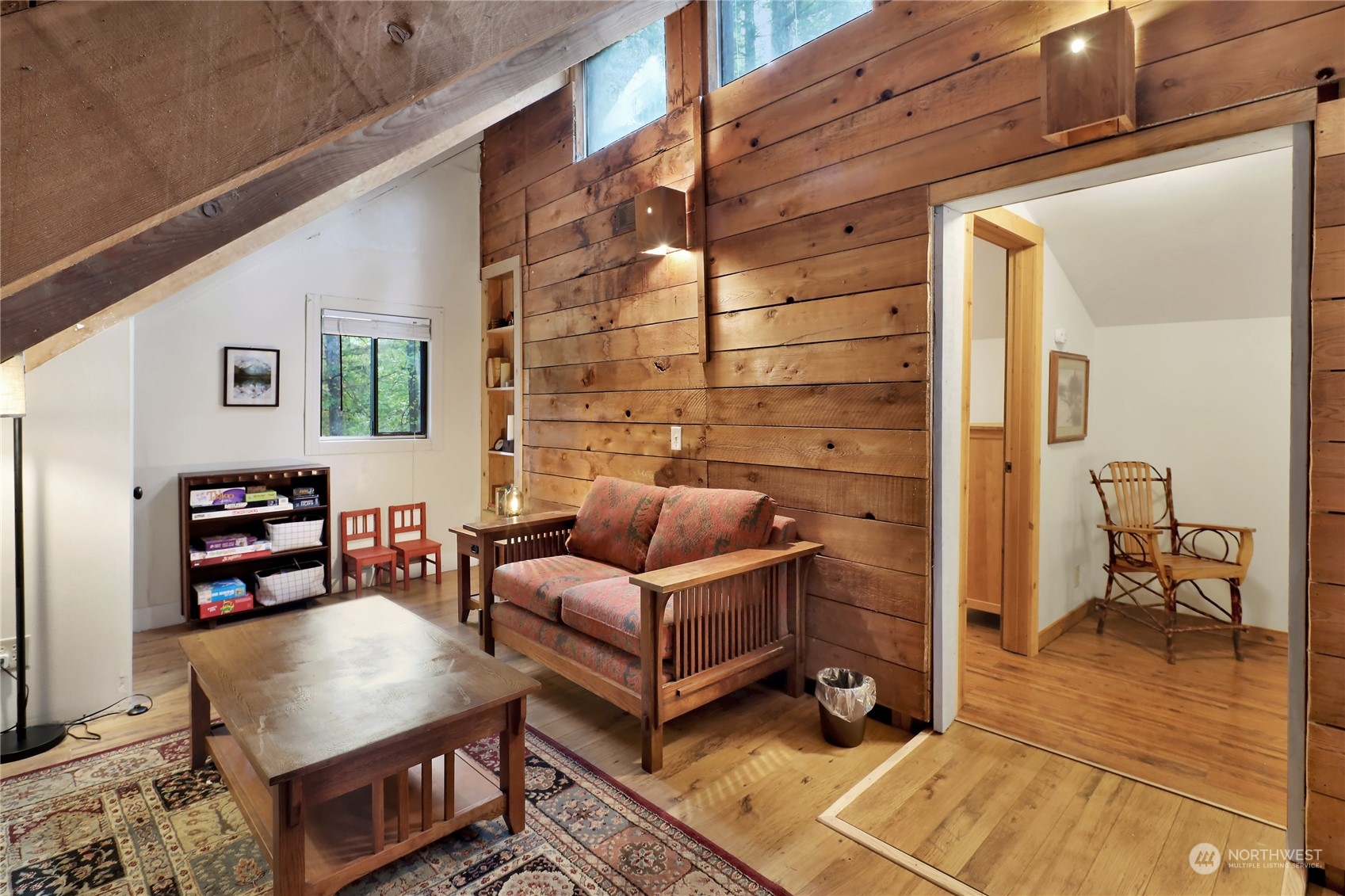 2011 Clear Valley Drive Maple Falls, WA 98266 - Photo 24 of 40 a living room with furniture and a flat screen tv