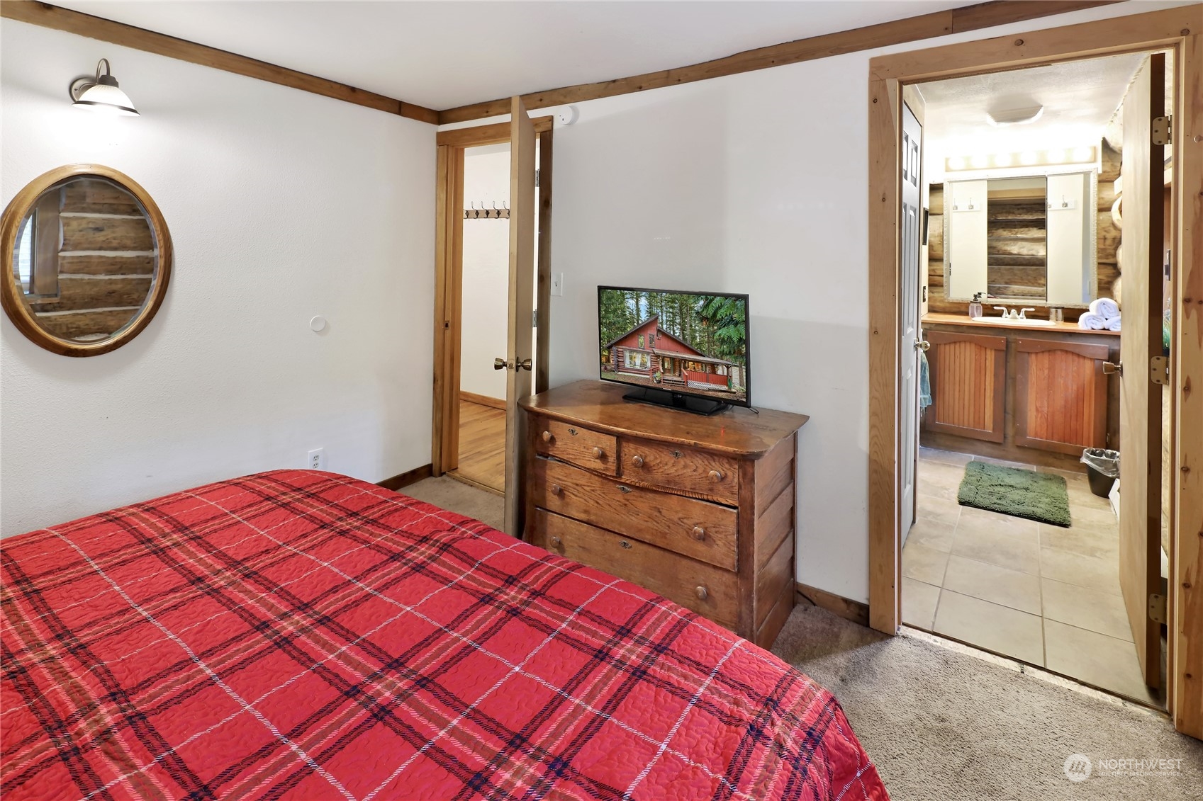 2011 Clear Valley Drive Maple Falls, WA 98266 - Photo 29 of 40 a bedroom with a bed and a flat screen tv