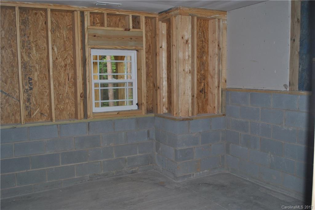 335 Creswell Road, Unit 1011 Mount Gilead, NC 27306 - Photo 15 of 18 a bathroom with a window