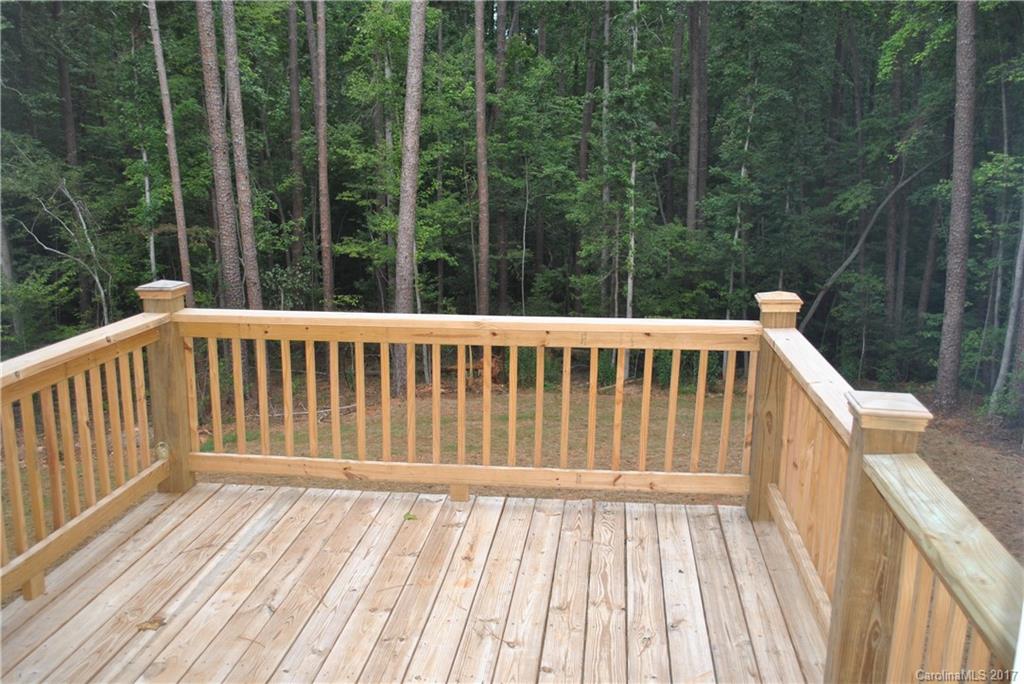 335 Creswell Road, Unit 1011 Mount Gilead, NC 27306 - Photo 17 of 18 a view of a wooden deck