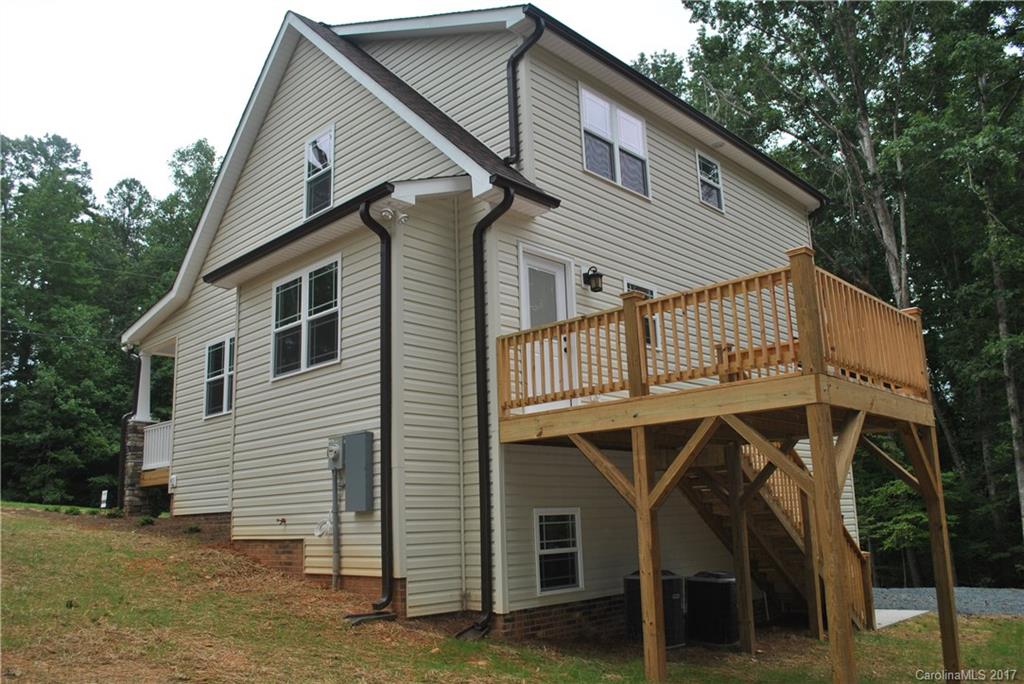 335 Creswell Road, Unit 1011 Mount Gilead, NC 27306 - Photo 4 of 18 a front view of a house with balcony