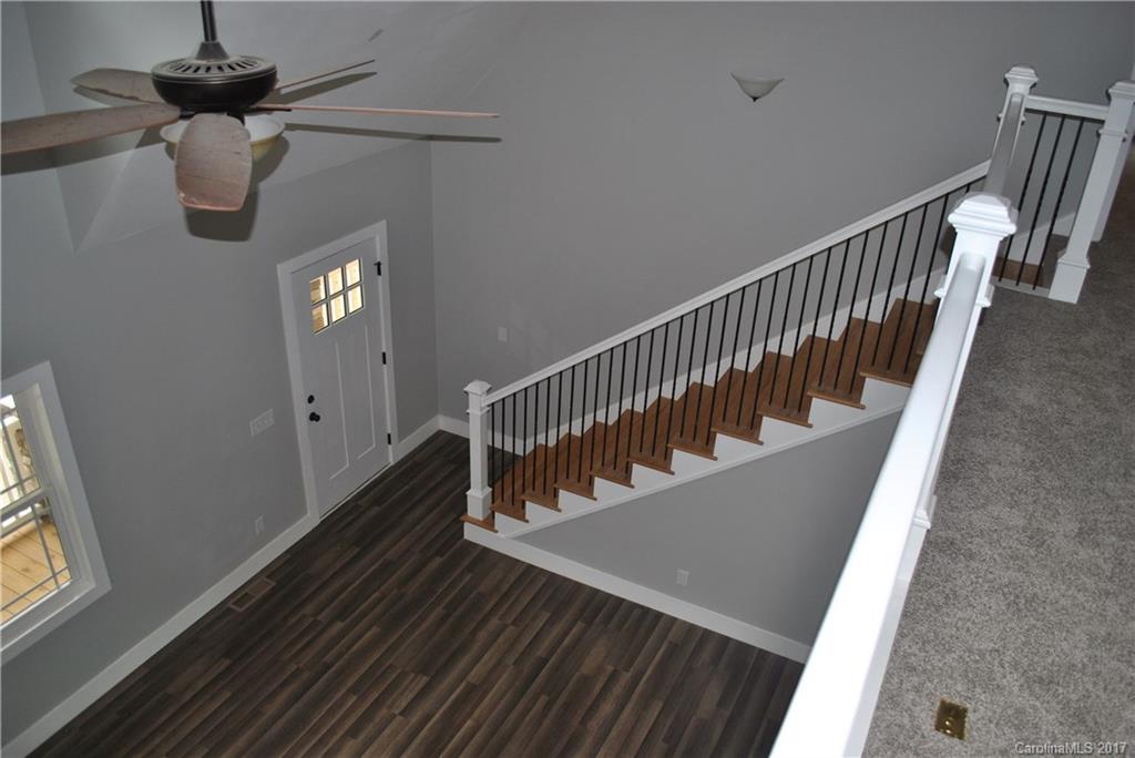335 Creswell Road, Unit 1011 Mount Gilead, NC 27306 - Photo 8 of 18 a view of balcony with wooden floor