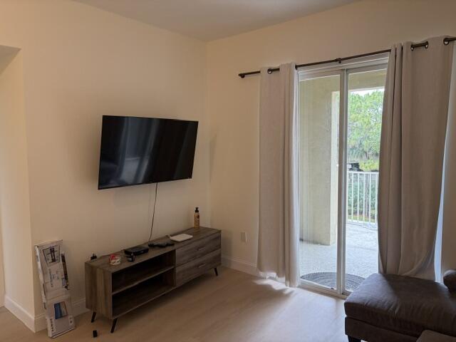 1155 Main Street, Unit 209 Jupiter, FL 33458 - Photo 5 of 9 Living room