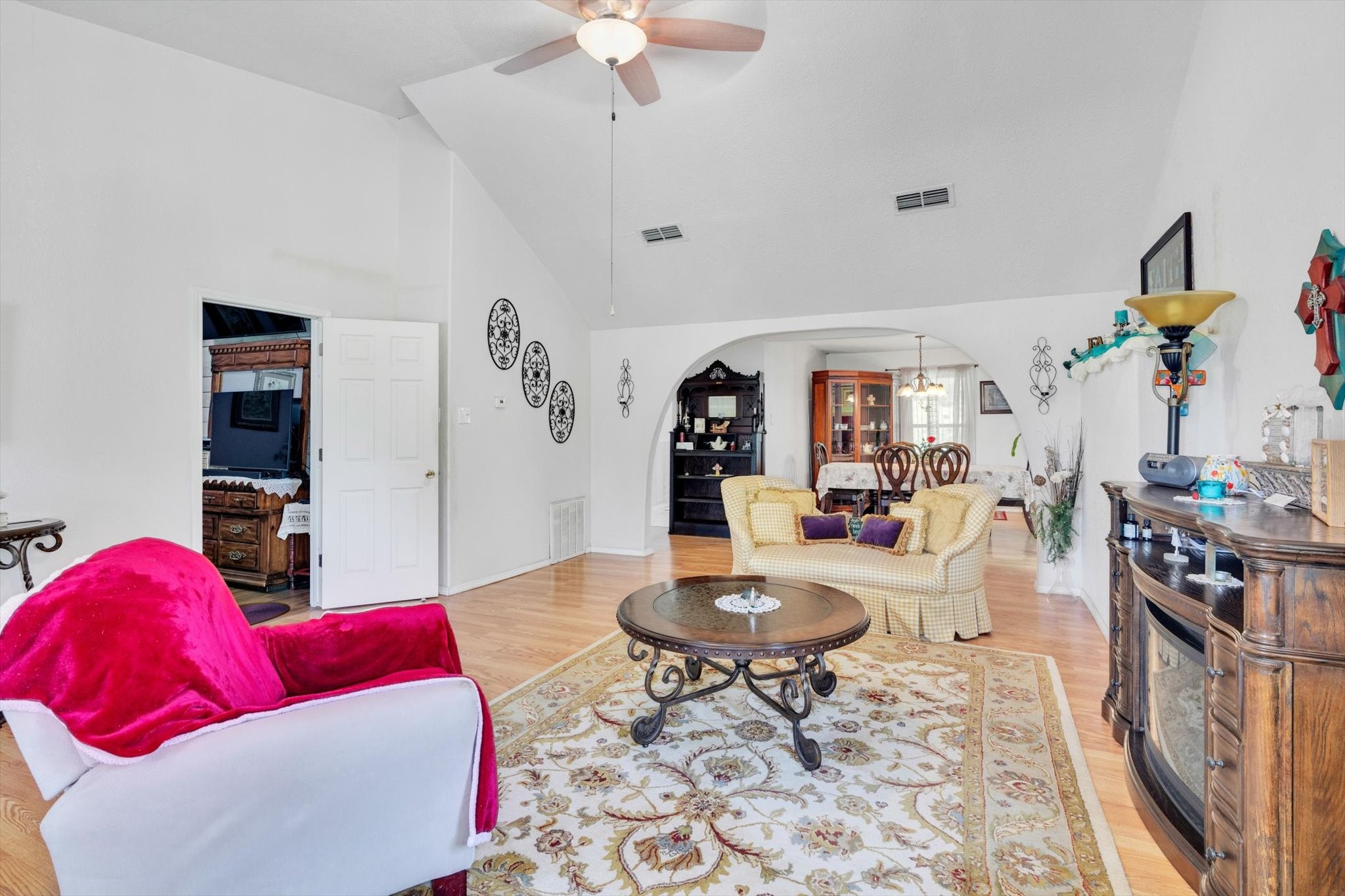 90 County Road 2852 Cleveland, TX 77327 - Photo 11 of 50 a living room with furniture and a chandelier