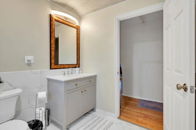 a bed room with a bed and a couch