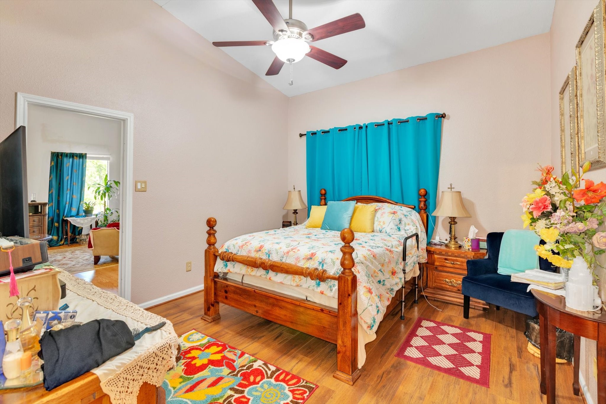 90 County Road 2852 Cleveland, TX 77327 - Photo 22 of 50 a bed room with a bed and a couch