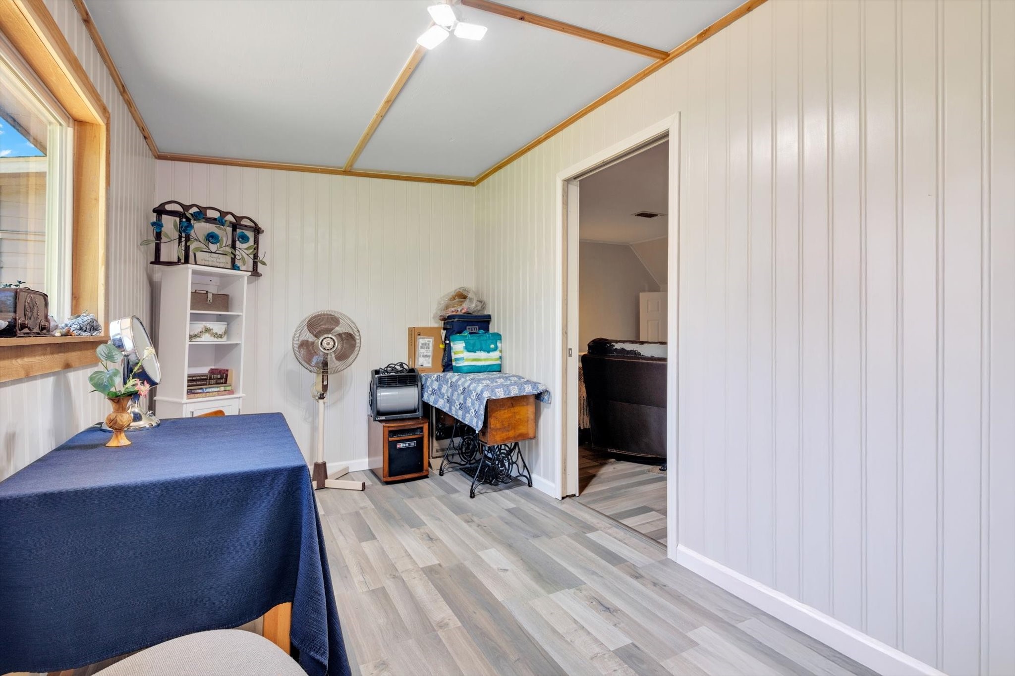 90 County Road 2852 Cleveland, TX 77327 - Photo 33 of 50 a living room with furniture and a wooden floor