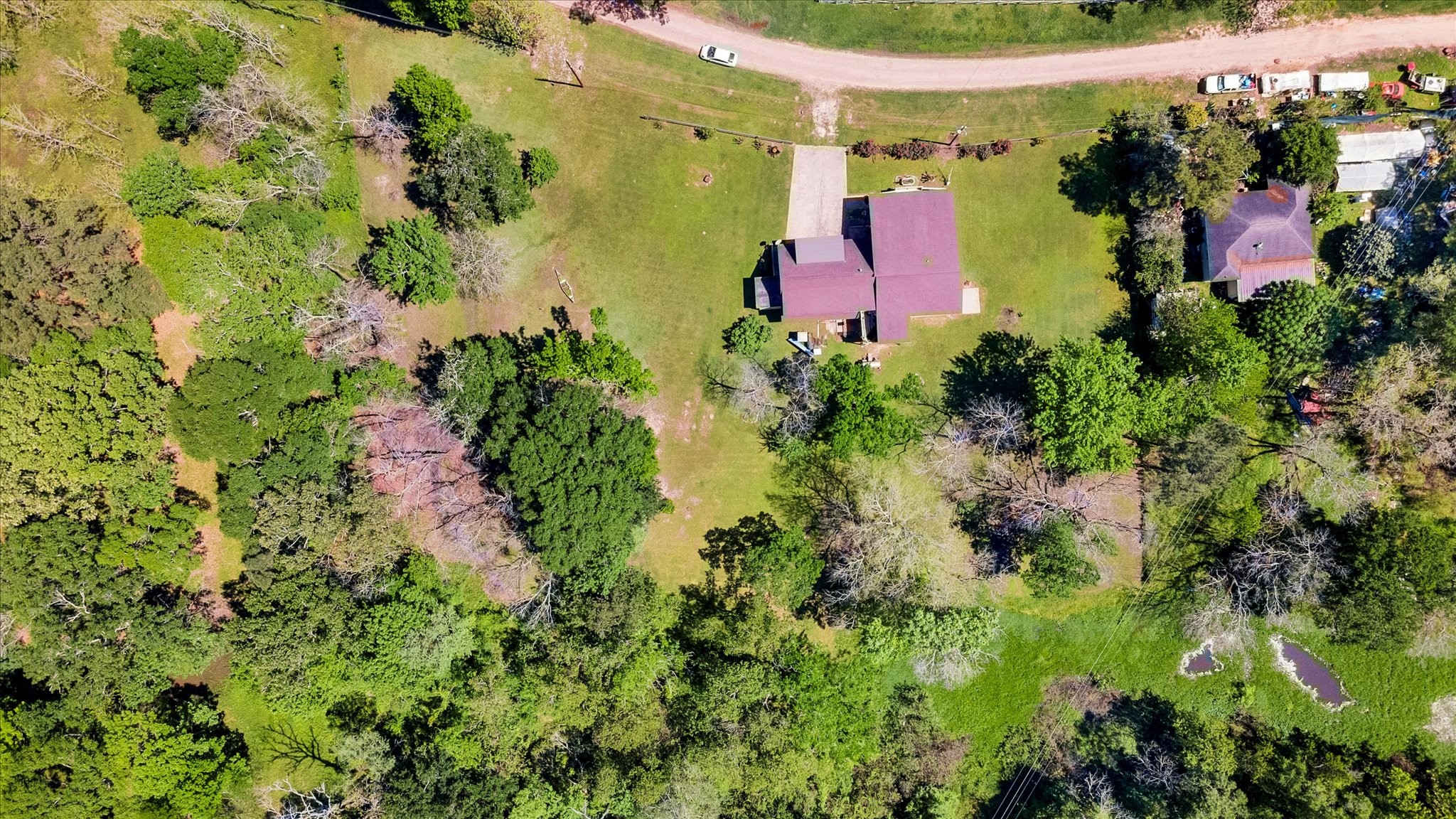 90 County Road 2852 Cleveland, TX 77327 - Photo 49 of 50 an aerial view of a house