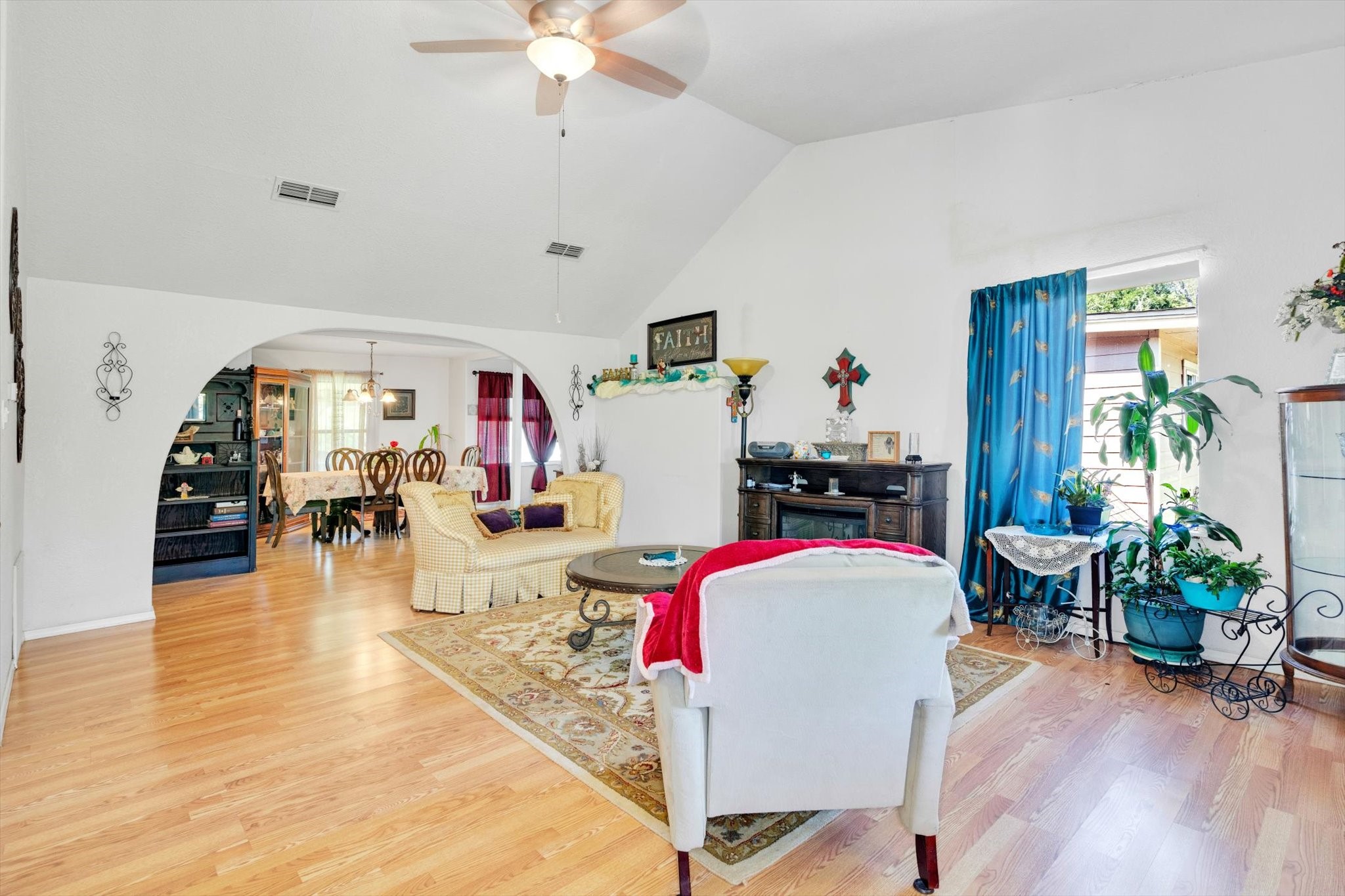 90 County Road 2852 Cleveland, TX 77327 - Photo 10 of 50 a living room with furniture and wooden floor