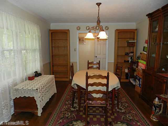 214 Gaither Road Winston-Salem, NC 27101 - Photo 3 of 15 Living Room. Formal Living Room being used as a Dining Room.