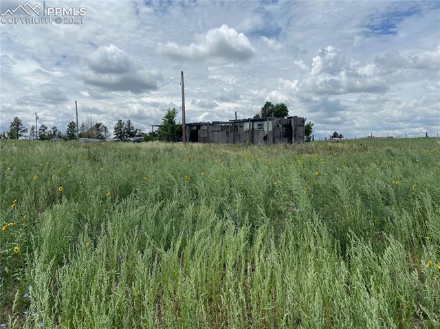 6451 South Johnson Road Rush, CO 80833 - Photo 23 of 46 2 Power Poles with Active Meter in Fenced in area