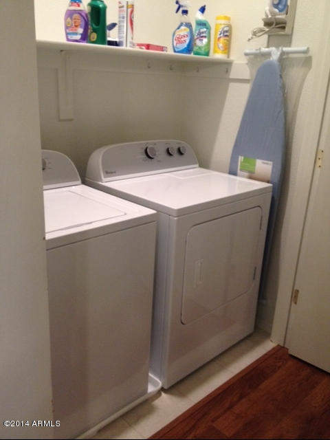 1250 South Rialto, Unit 62 Mesa, AZ 85209 - Photo 23 of 24 a utility room with dryer and washer