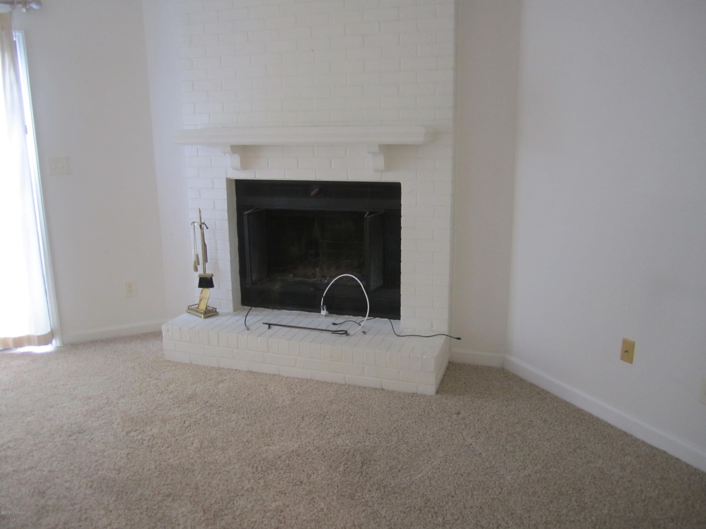 1910 Quail Ridge Road, Unit G Greenville, NC 27858 - Photo 12 of 22 Fireplace