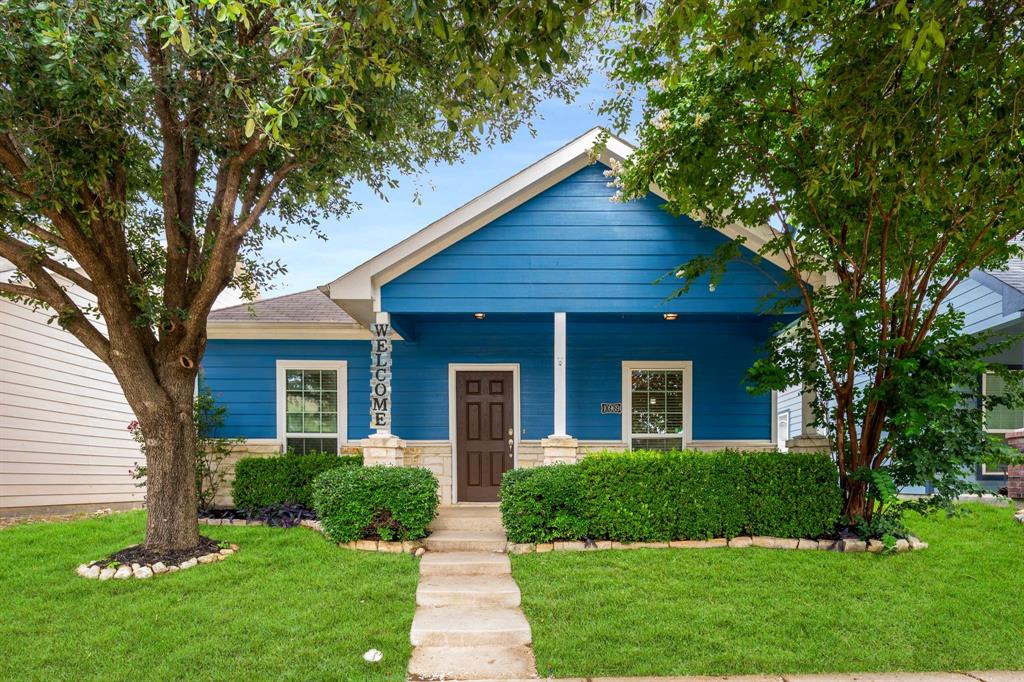 10969 Colonial Heights Lane Fort Worth, TX 76179 - Photo 1 of 34 a front view of a house with a yard