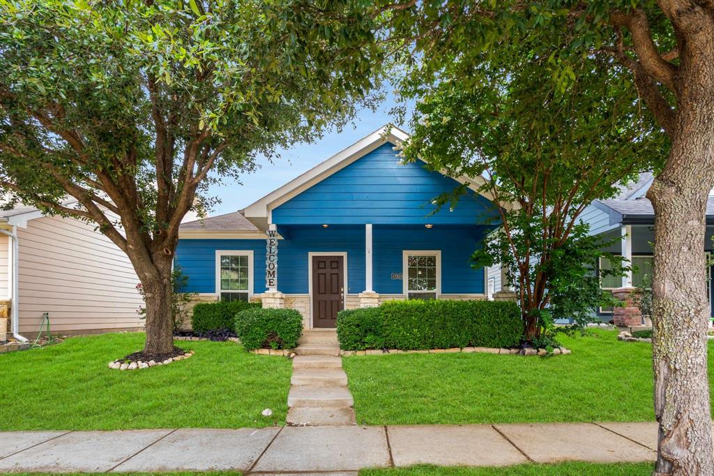 10969 Colonial Heights Lane Fort Worth, TX 76179 - Photo 2 of 34 a front view of a house with a yard