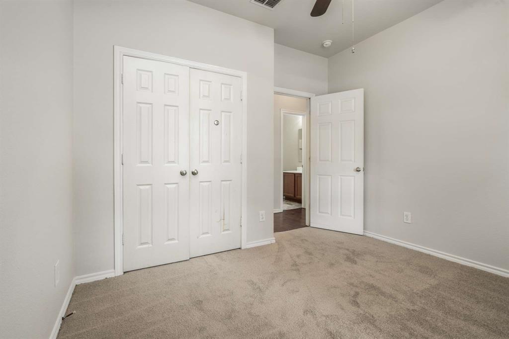 10969 Colonial Heights Lane Fort Worth, TX 76179 - Photo 21 of 34 a view of an empty room