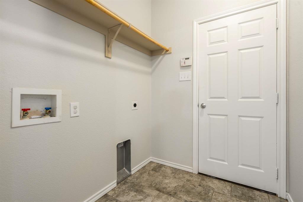 10969 Colonial Heights Lane Fort Worth, TX 76179 - Photo 22 of 34 a view of storage and utility room with closet